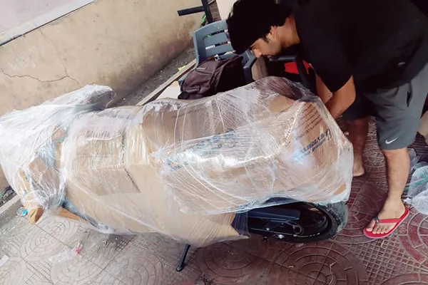 Bike packed with protective wrapping for two-wheeler transportation
